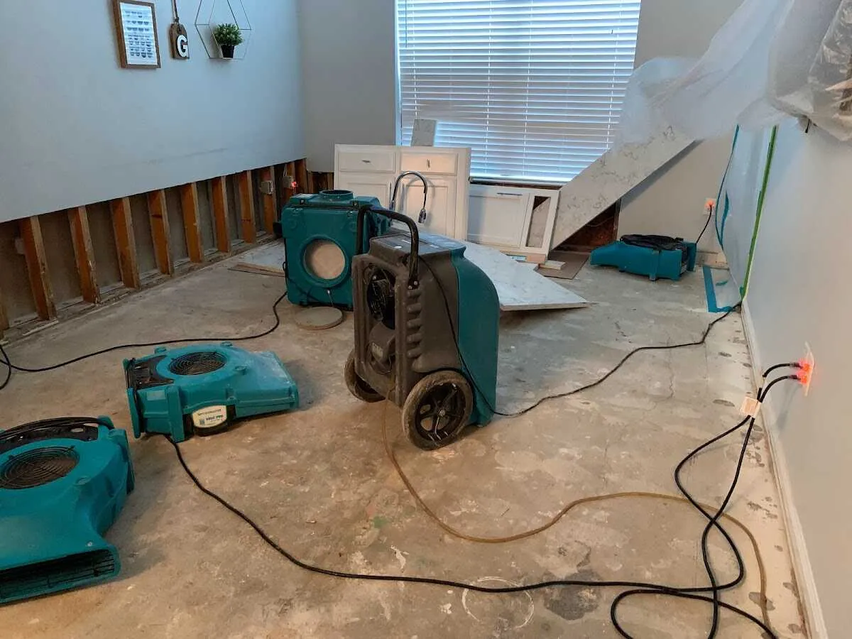Dehumidifier in flood-cut room for Water Damage Restoration in Normal